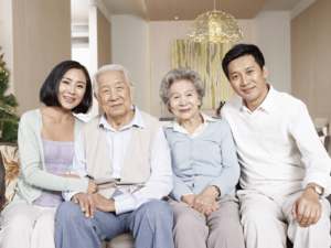 Older parents with their children on couch